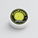 A small container of ConPanna grease with a label that includes the brand name 