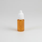A bottle of 80W Air Piston Oil with a white cap on a white background.